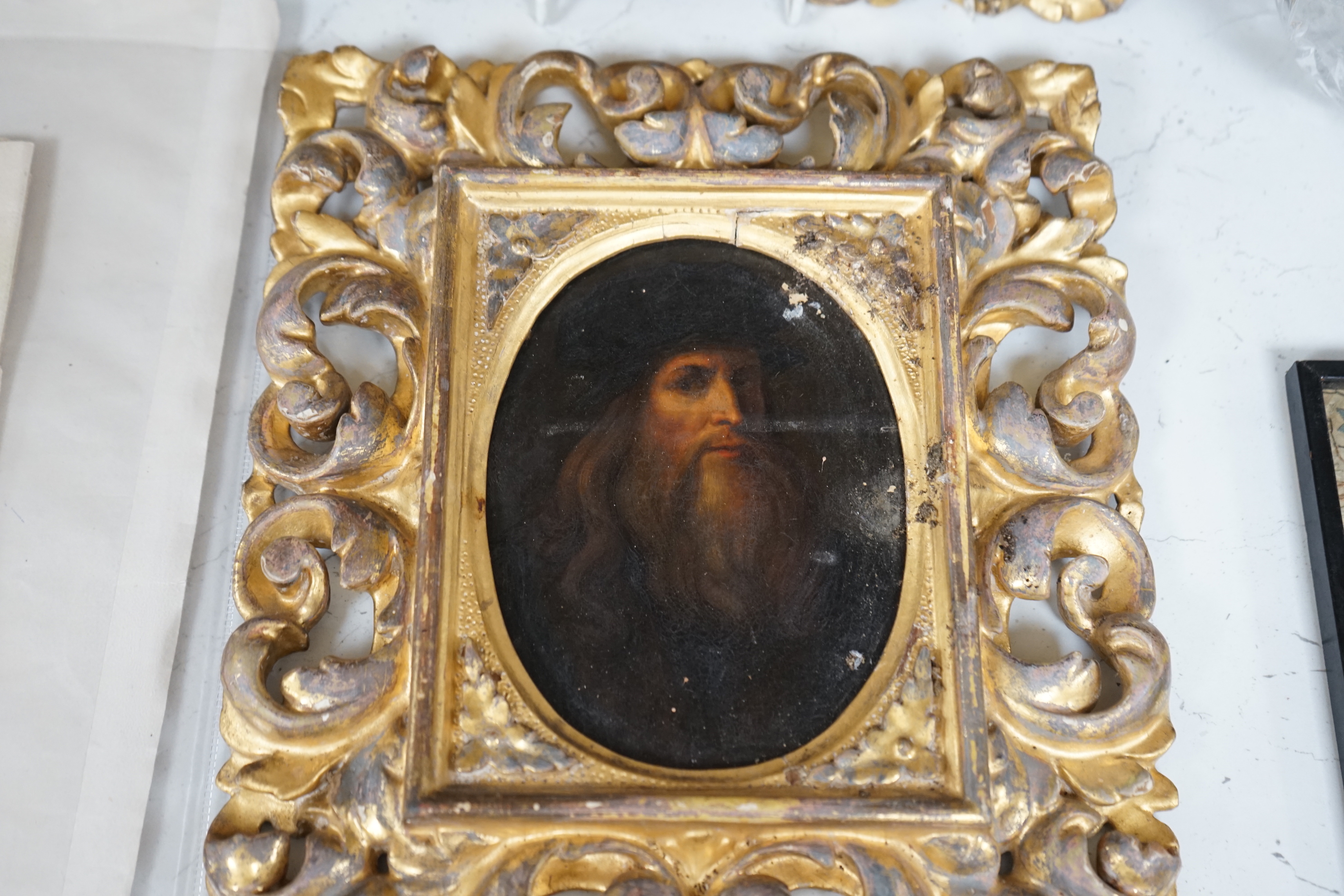 A set of three 19th century Old Master style oils on board, portraits after Leonardo Da Vinci (1452-1519) Raphael (1483-1520) and one other, indistinct ink descriptions verso, housed in gilt Florentine gilt frames, large